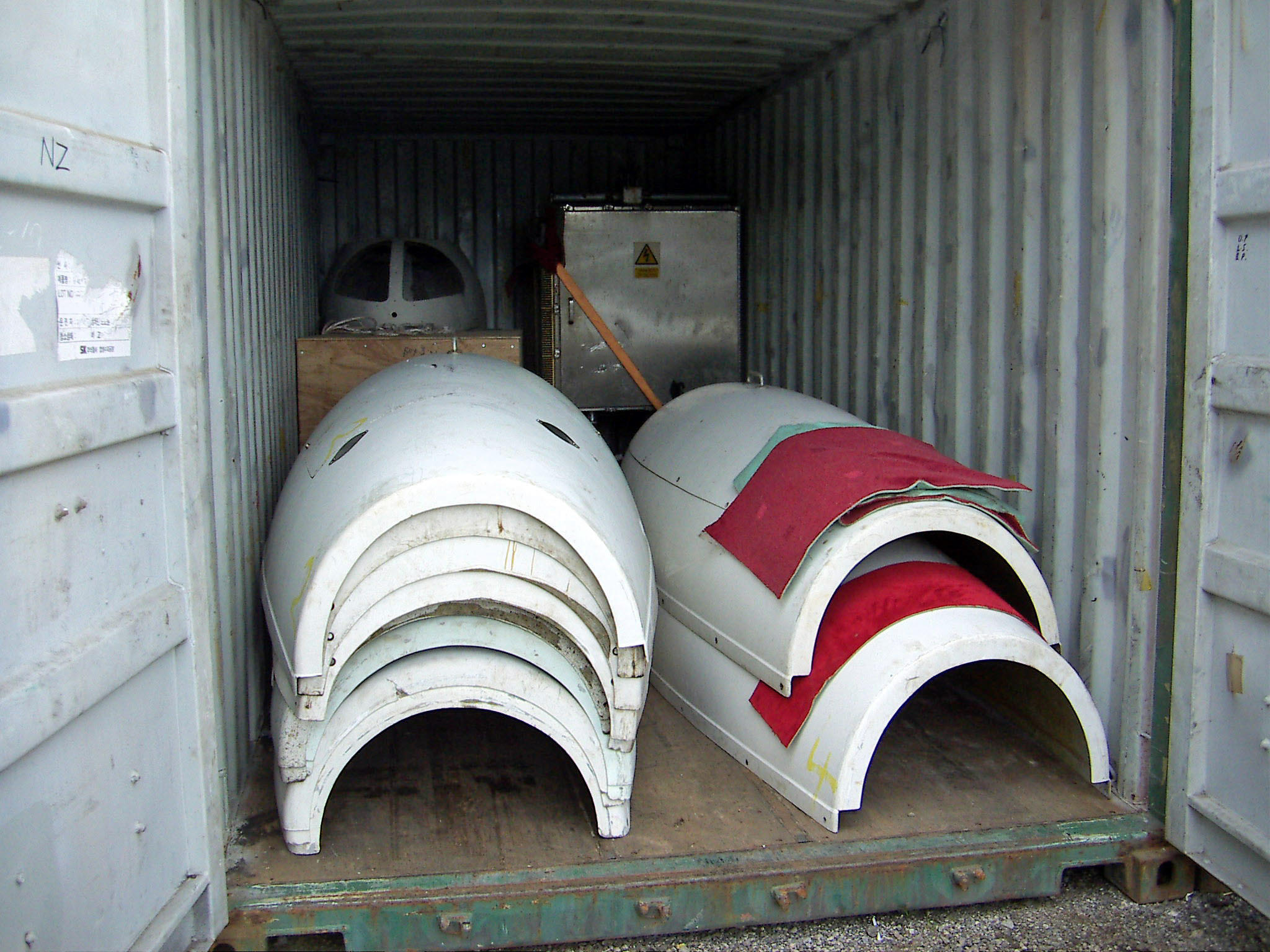 Carter nacelle covers and rotor components packed inside a shipping container bound for New Zealand