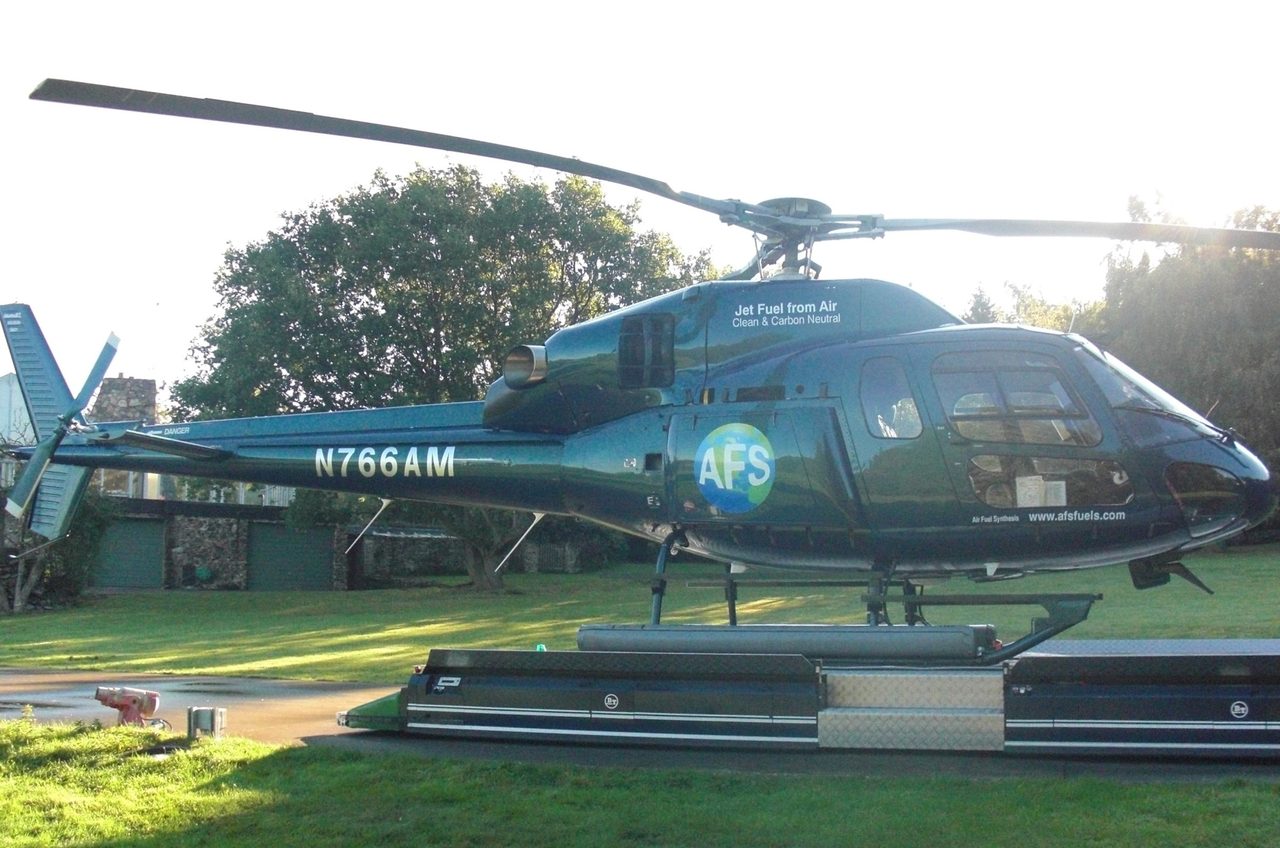 Air Fuel Synthesis helicopter (registration N766AM) branded 'Jet Fuel from Air — Clean & Carbon Neutral'